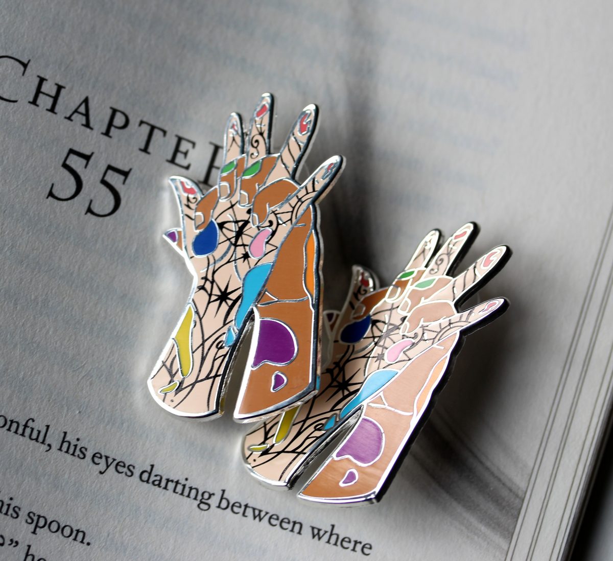 acotar enamel pin