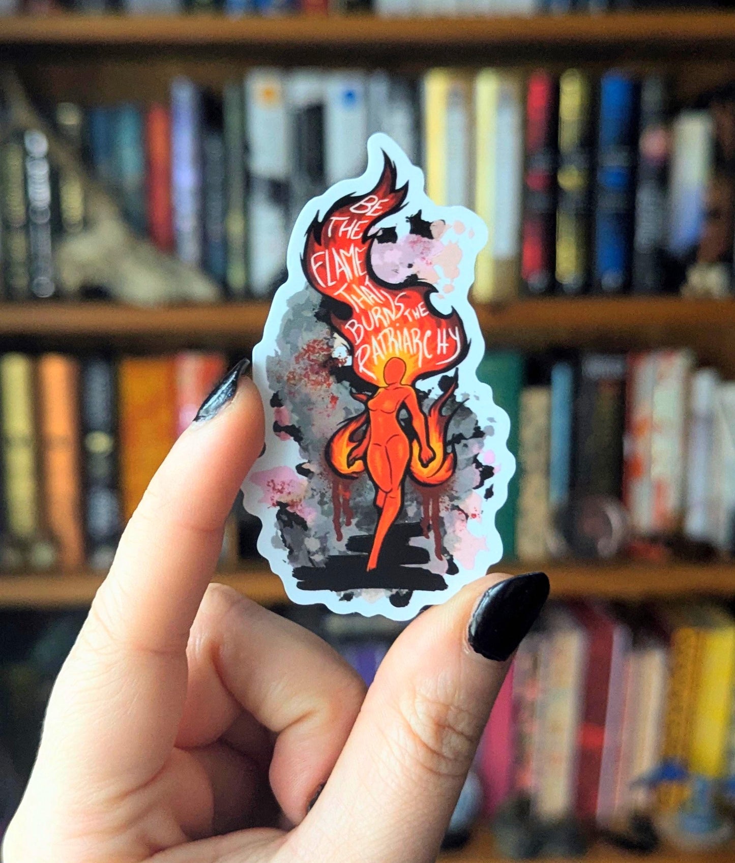 be the flame that burns the patriarchy feminine rage translucent sticker