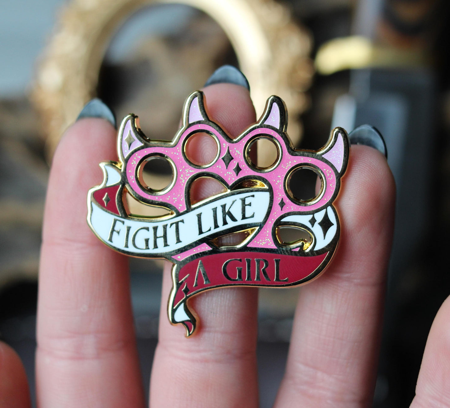 Feminist knuckleduster feminine rage enamel pin
