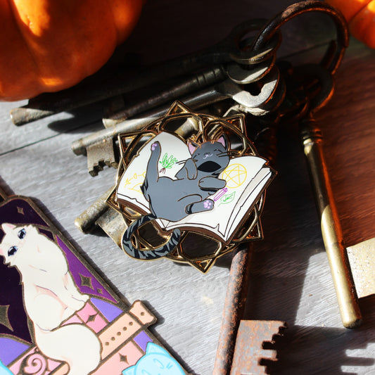 It's a trap- Felines and Folios enamel pin
