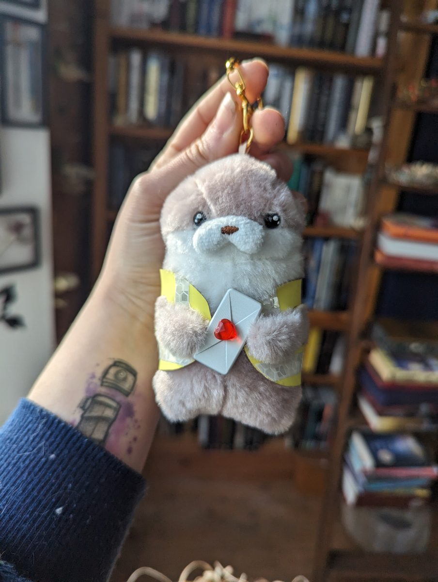 messenger otter keychain plushie