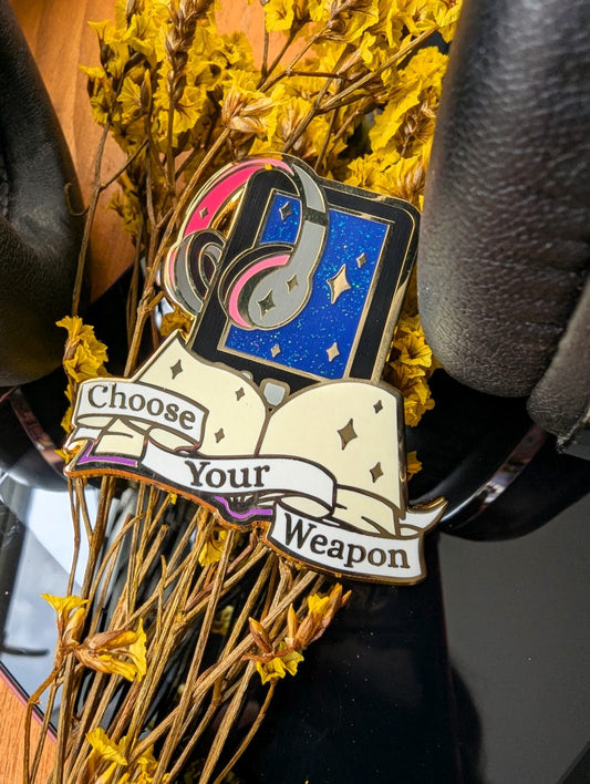 choose your weapon enamel pin