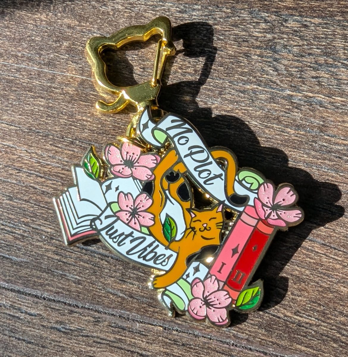 cat book keychain