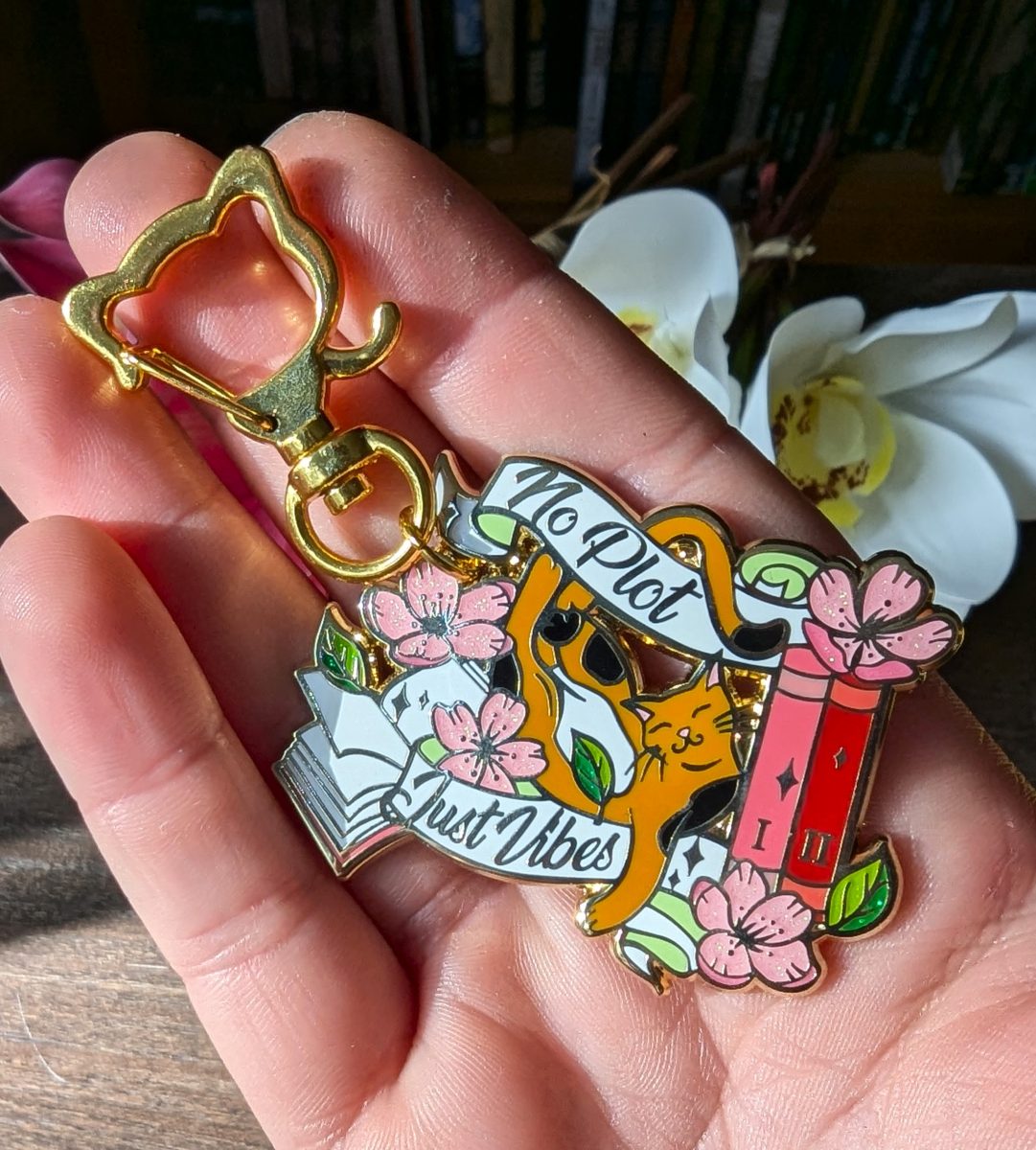 cat book keychain