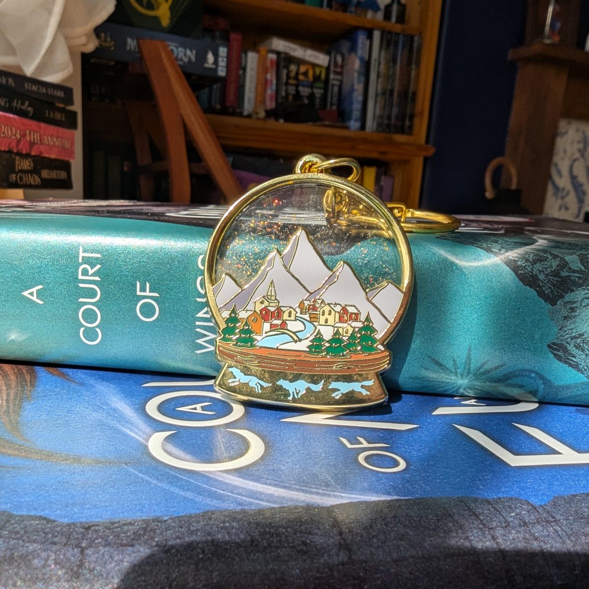 velaris snow globe liquid keychain