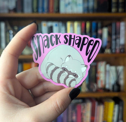 Snack shaped chaotic raccoon vinyl sticker