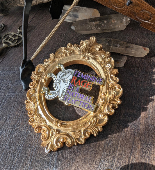 Feminine rage is a natural reaction enamel pin