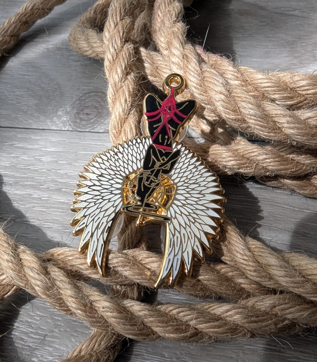 Divine Suspension Shibari enamel pin, rope label badge