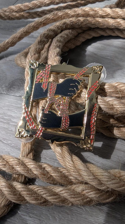 Frame of Mind Shibari enamel pin, rope label badge
