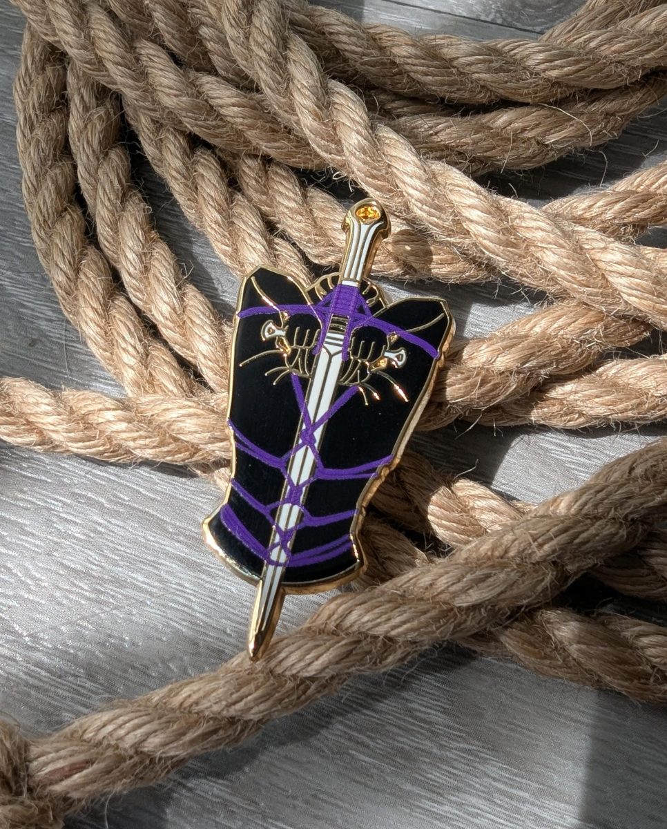 The Blade Shibari enamel pin, rope label badge