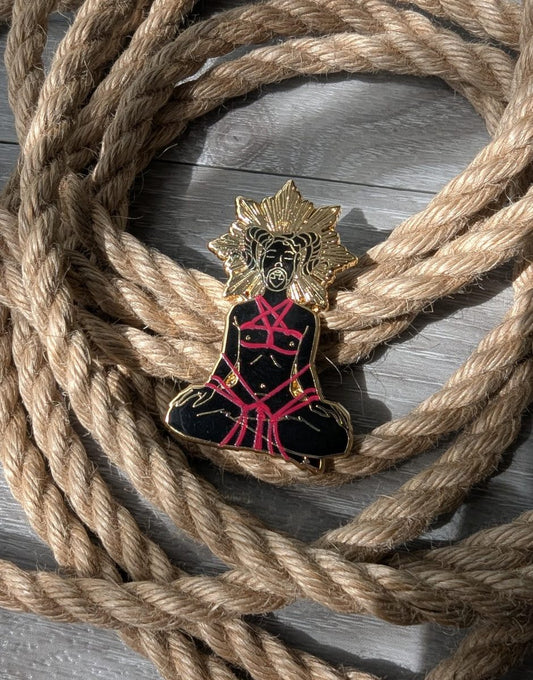 the Summoning Shibari enamel pin, rope label badge