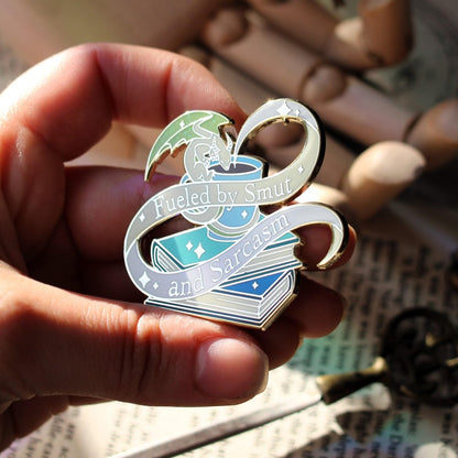 Smut and Sarcasm bookish enamel pin, book lover badge